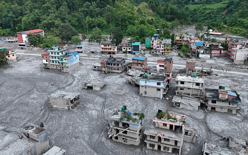 An Aerial view shows debris and mud covering settlements following flash floods on August 28, 2026 in DevGhat village, Nepal.Ritesh Shukla—Getty Images